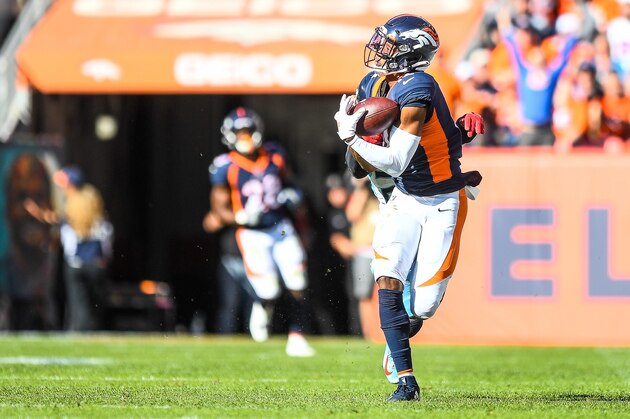 DENVER, CO - OCTOBER 13:  Courtland Sutton #14 of the Denver Broncos comes down with a 40-yard reception for a first down against the Tennessee Titans in the second quarter of a game at Empower Field at Mile High on October 13, 2019 in Denver, Colorado. (Photo by Dustin Bradford/Getty Images)