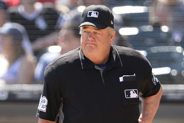 CHICAGO - AUGUST 29:  Umpire Joe West #22 looks on during the game between the Minnesota Twins and Chicago White Sox on August 29, 2019 at Guaranteed Rate Field in Chicago, Illinois.  (Photo by Ron Vesely/MLB Photos via Getty Images)