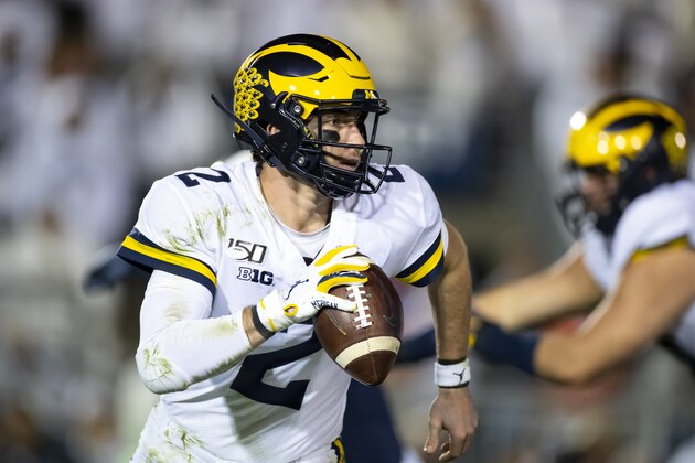 UNIVERSITY PARK, PA - OCTOBER 19:  Shea Patterson #2 of the Michigan Wolverines runs with the ball during the fourth quarter against the Penn State Nittany Lions on October 19, 2019 at Beaver Stadium in University Park, Pennsylvania. Penn State defeats Michigan 28-21.  (Photo by Brett Carlsen/Getty Images)
