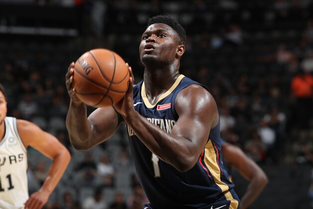 SAN ANTONIO, TX - OCTOBER 13: Zion Williamson #1 of the New Orleans Pelicans shoots the ball during a pre-season game against the San Antonio Spurs on October 13, 2019 at the AT&T Center in San Antonio, Texas. NOTE TO USER: User expressly acknowledges and agrees that, by downloading and or using this photograph, user is consenting to the terms and conditions of the Getty Images License Agreement. Mandatory Copyright Notice: Copyright 2019 NBAE (Photos by Joe Murphy/NBAE via Getty Images)