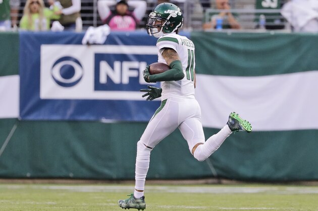 New York Jets' Robby Anderson looks back as he runs for a touchdown during the first half of an NFL football game against the Dallas Cowboys, Sunday, Oct. 13, 2019, in East Rutherford, N.J. (AP Photo/Frank Franklin II)