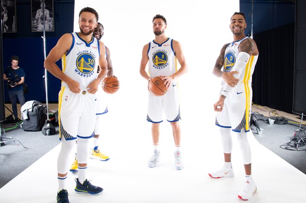 SAN FRANCISCO, CA - SEPTEMBER 30: Stephen Curry #30, Draymond Green #23, Klay Thompson #11, and D'Angelo Russell #0 of the Golden State Warriors pose for a portrait during media day on September 30, 2019 at the Biofreeze Performance Center in San Francisco, California. NOTE TO USER: User expressly acknowledges and agrees that, by downloading and/or using this photograph, user is consenting to the terms and conditions of the Getty Images License Agreement. Mandatory Copyright Notice: Copyright 2019 NBAE (Photo by Noah Graham/NBAE via Getty Images)