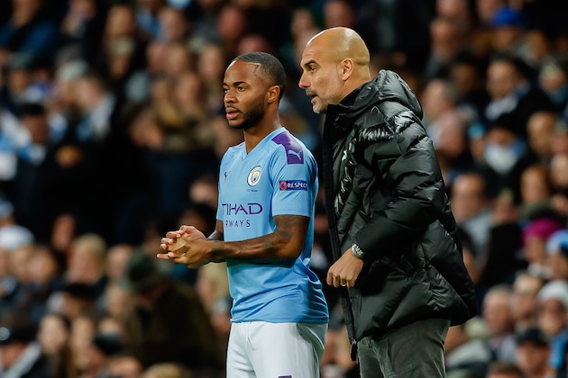 MANCHESTER, ENGLAND - OCTOBER 01: Raheem Sterling of FC Manchester City, head coach Josep Guardiola of FC Manchester City speaks with during the UEFA Champions League group C match between Manchester City and Dinamo Zagreb at Etihad Stadium on October 1, 2019 in Manchester, United Kingdom. (Photo by TF-Images/Getty Images)