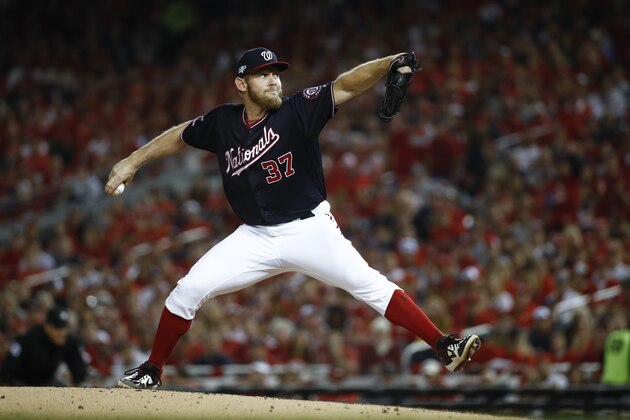 Washington Nationals starting pitcher Stephen Strasburg throws during the second inning of Game 3 of the baseball National League Championship Series against the St. Louis Cardinals Monday, Oct. 14, 2019, in Washington. (AP Photo/Patrick Semansky)
