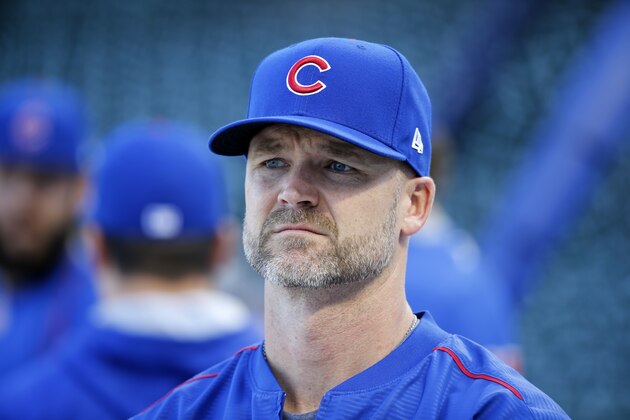 Chicago Cubs' David Ross waits for his turn during batting practice before baseball's National League Championship Series against the Los Angeles Dodgers, Friday, Oct. 14, 2016, in Chicago. The Cubs host Game 1 of the series against the Dodgers on Saturday. (AP Photo/Charles Rex Arbogast)