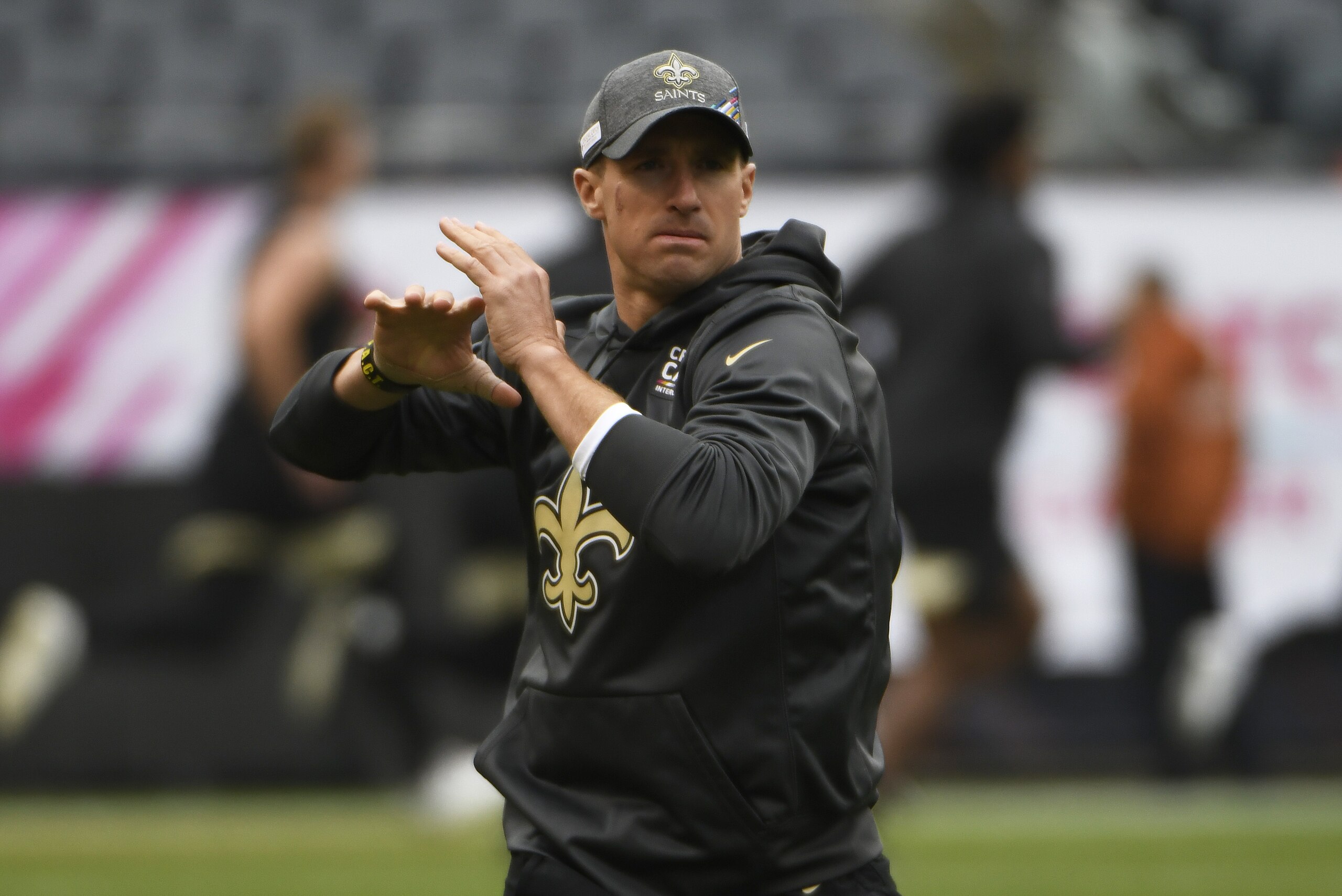 CHICAGO, ILLINOIS - OCTOBER 20: Drew Brees #9 of the New Orleans Saints warms up before the game against the Chicago Bears at Soldier Field on October 20, 2019 in Chicago, Illinois. (Photo by David Banks/Getty Images) CHICAGO, ILLINOIS - OCTOBER 20: Drew Brees #9 of the New Orleans Saints warms up before the game against the Chicago Bears at Soldier Field on October 20, 2019 in Chicago, Illinois. (Photo by David Banks/Getty Images)