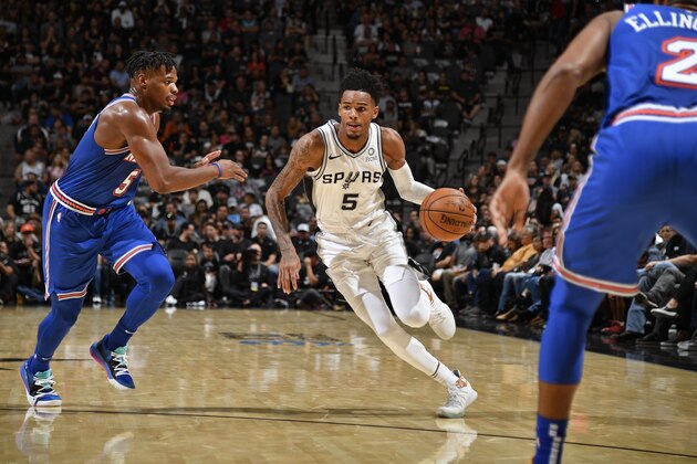SAN ANTONIO, TX - OCTOBER 23: Dejounte Murray #5 of the San Antonio Spurs drives to the basket against the New York Knicks on October 23, 2019 at the AT&T Center in San Antonio, Texas. NOTE TO USER: User expressly acknowledges and agrees that, by downloading and or using this photograph, user is consenting to the terms and conditions of the Getty Images License Agreement. Mandatory Copyright Notice: Copyright 2019 NBAE (Photos by Logan Riely/NBAE via Getty Images) SAN ANTONIO, TX - OCTOBER 23: Dejounte Murray #5 of the San Antonio Spurs drives to the basket against the New York Knicks on October 23, 2019 at the AT&T Center in San Antonio, Texas. NOTE TO USER: User expressly acknowledges and agrees that, by downloading and or using this photograph, user is consenting to the terms and conditions of the Getty Images License Agreement. Mandatory Copyright Notice: Copyright 2019 NBAE (Photos by Logan Riely/NBAE via Getty Images)
