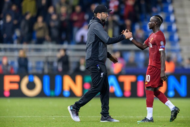 GENK, BELGIUM - OCTOBER 23: Juergen Klopp and Mohamed Salah of Liverpool during the UEFA Champions League group E match between KRC Genk and Liverpool FC at Luminus Arena on October 23, 2019 in Genk, Belgium. (Photo by Jörg Schüler/Getty Images)
