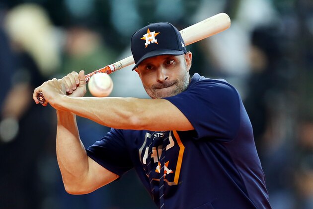 HOUSTON, TEXAS - OCTOBER 13: Joe Espada #19 of the Houston Astros hits a ball before game two of the American League Championship Series against the New York Yankees at Minute Maid Park on October 13, 2019 in Houston, Texas. (Photo by Bob Levey/Getty Images)