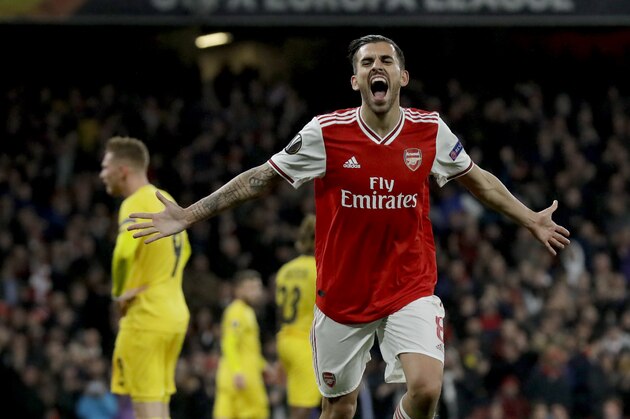 Arsenal's Dani Ceballos celebrates scoring his team's fourth goal during the Europa League Group F soccer match between Arsenal and Standard Liege at the Emirates Stadium, in London, Thursday, Oct. 3, 2019. (AP Photo/Matt Dunham)
