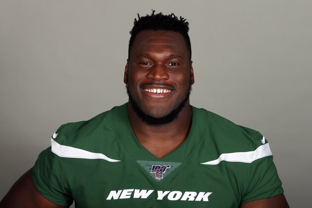 FILE - This is a 2019, file photo, shows Kelechi Osemele of the New York Jets NFL football team. Osemele says he needs season-ending shoulder surgery and is waiting for the team to authorize the procedure. Osemele said Friday, OCt. 18, 2019, that the team doctor and an outside doctor have both recommended the surgery. But a person with direct knowledge of the situation tells The Associated Press both doctors determined it is actually a pre-existing injury and cleared Osemele to play through the injury and not have the surgery until after the season. (AP Photo/File)