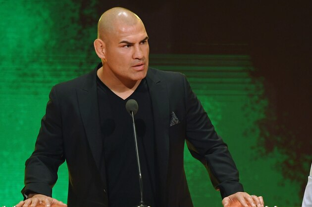 LAS VEGAS, NEVADA - OCTOBER 11:  Former UFC heavyweight champion Cain Velasquez (L) speaks as WWE wrestler Rey Mysterio looks on at a WWE news conference at T-Mobile Arena on October 11, 2019 in Las Vegas, Nevada. Velasquez will face WWE champion Brock Lesnar and WWE wrestler Braun Strowman will take on heavyweight boxer Tyson Fury at the WWE's Crown Jewel event at Fahd International Stadium in Riyadh, Saudi Arabia on October 31.  (Photo by Ethan Miller/Getty Images)