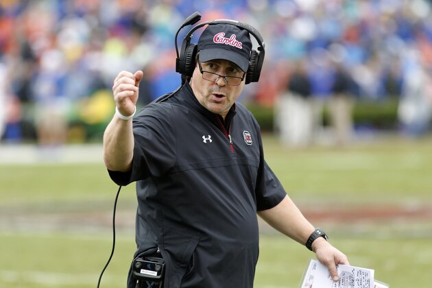 South Carolina's head coach Will Muschamp talks to players during the game against Florida in the second half of an NCAA college football game Saturday, Oct. 19, 2019, in Columbia, SC. (AP Photo/Mic Smith)
