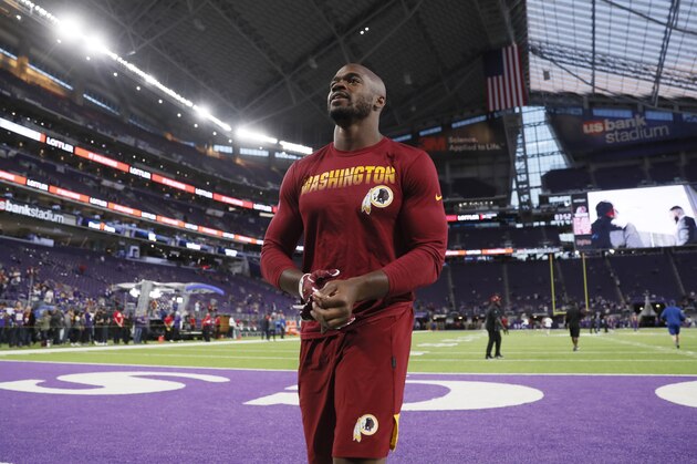 Washington Redskins running back Adrian Peterson walks on the field before an NFL football game against the Minnesota Vikings, Thursday, Oct. 24, 2019, in Minneapolis. (AP Photo/Charlie Neibergall)
