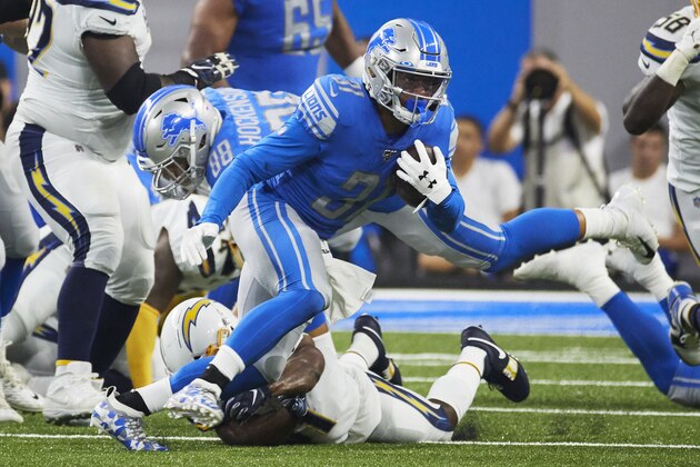 Detroit Lions running back Ty Johnson (31) rushes against the Los Angeles Chargers during an NFL football game, Sunday, Sept. 15, 2019, in Detroit. (AP Photo/Rick Osentoski)