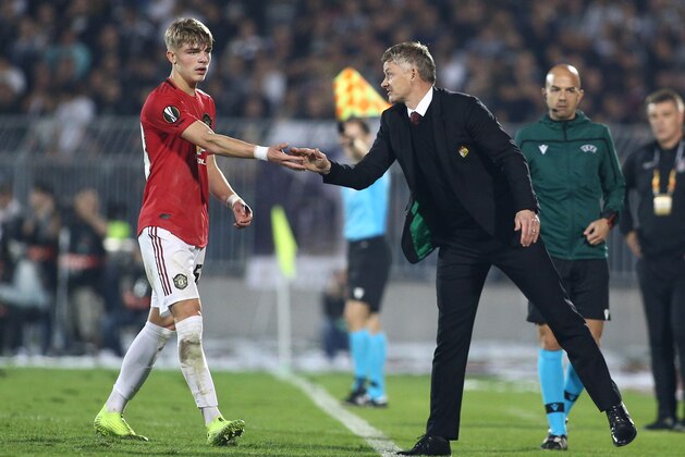 BELGRADE, SERBIA - OCTOBER 24: Manager Ole Gunnar Solskjaer of Manchester United and Brandon Williams of Manchester United during the UEFA Europa League group L match between Partizan and Manchester United at Partizan Stadium on October 24, 2019 in Belgrade, Serbia. (Photo by MB Media/Getty Images)
