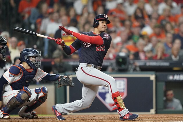 Washington Nationals' Juan Soto hits a double during the third inning of Game 2 of the baseball World Series against the Houston Astros Wednesday, Oct. 23, 2019, in Houston. (AP Photo/David J. Phillip)