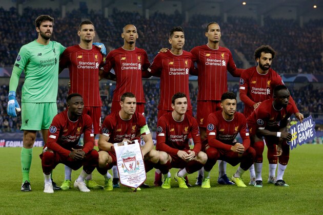 GENK, BELGIUM - OCTOBER 23: Alisson Becker of Liverpool FC, Fabinho of Liverpool FC, Virgil van Dijk of Liverpool FC, Georginio Wijnaldum of Liverpool FC, Dejan Lovren of Liverpool FC, James Milner of Liverpool FC, Naby Keita of Liverpool FC, Roberto Firmino of Liverpool FC, Sadio Mane of Liverpool FC, Mohamed Salah of Liverpool FC, Alex Oxlade Chamberlain of Liverpool FC, Andy Robertson of Liverpool FC, teamphoto of Liverpool FC  during the UEFA Champions League  match between Genk v Liverpool at the Cristal Arena on October 23, 2019 in Genk Belgium (Photo by Soccrates/Getty Images)
