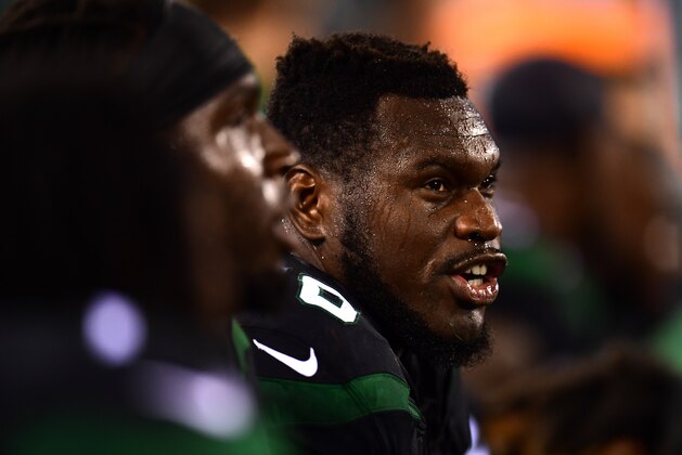 EAST RUTHERFORD, NEW JERSEY - SEPTEMBER 16: Kelechi Osemele #70 of the New York Jets sits on the sidelines during their game against the Cleveland Browns at MetLife Stadium on September 16, 2019 in East Rutherford, New Jersey. (Photo by Emilee Chinn/Getty Images)