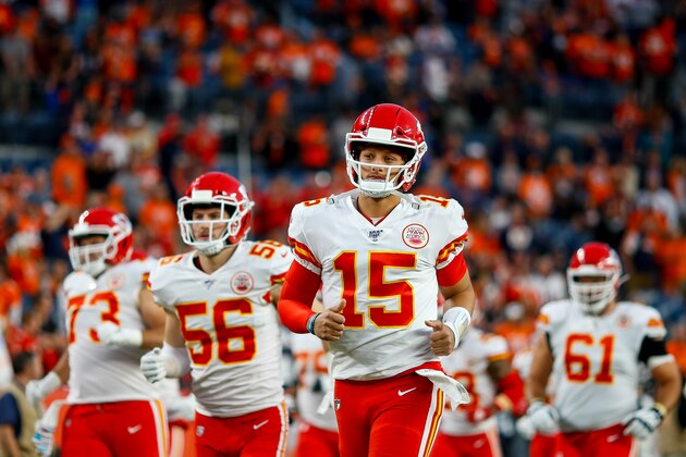 DENVER, CO - OCTOBER 17:  Quarterback Patrick Mahomes #15 of the Kansas City Chiefs leads his team onto the field before a game against the Denver Broncos at Empower Field at Mile High on October 17, 2019 in Denver, Colorado. (Photo by Justin Edmonds/Getty Images)