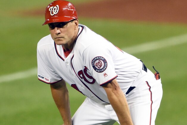 WASHINGTON, DC - SEPTEMBER 23:  First base coach Tim Bogar #24 of the Washington Nationals in position during a baseball game against the Philadelphia Phillies at Nationals Park on September 23, 2019 in Washington, DC.  (Photo by Mitchell Layton/Getty Images)