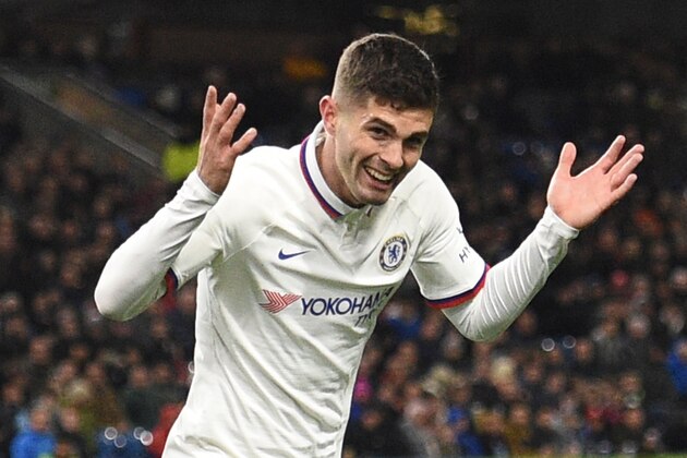 Chelsea's US midfielder Christian Pulisic celebrates scoring their third goal to complete his hattrick during the English Premier League football match between Burnley and Chelsea at Turf Moor in Burnley, north west England on October 26, 2019. (Photo by Oli SCARFF / AFP) / RESTRICTED TO EDITORIAL USE. No use with unauthorized audio, video, data, fixture lists, club/league logos or 'live' services. Online in-match use limited to 120 images. An additional 40 images may be used in extra time. No video emulation. Social media in-match use limited to 120 images. An additional 40 images may be used in extra time. No use in betting publications, games or single club/league/player publications. /  (Photo by OLI SCARFF/AFP via Getty Images)