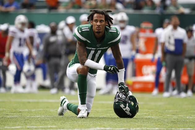 EAST RUTHERFORD, NEW JERSEY - SEPTEMBER 08: Robby Anderson #11 of the New York Jets takes a knee during a review during a game against the Buffalo Bills at MetLife Stadium on September 08, 2019 in East Rutherford, New Jersey. (Photo by Michael Owens/Getty Images)