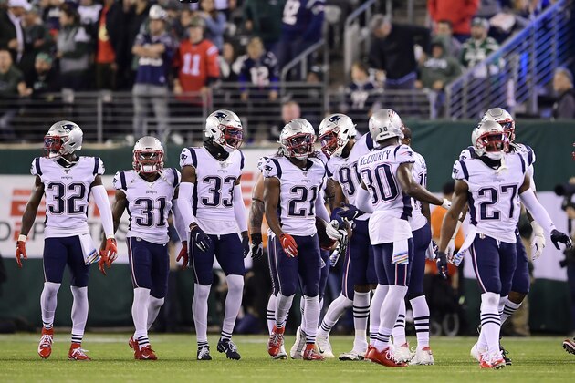 EAST RUTHERFORD, NEW JERSEY - OCTOBER 21:  Duron Harmon #21 of the New England Patriots is congratulated by his teammates after an interception against the New York Jets at MetLife Stadium on October 21, 2019 in East Rutherford, New Jersey. (Photo by Steven Ryan/Getty Images)