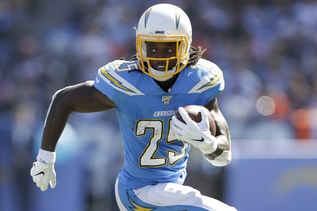 Los Angeles Chargers running back Melvin Gordon runs against the Denver Broncos during the first half of an NFL football game Sunday, Oct. 6, 2019, in Carson, Calif. (AP Photo/Marcio Jose Sanchez)