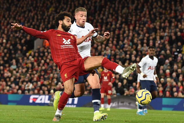 Liverpool's Egyptian midfielder Mohamed Salah (L) is blocked by Tottenham Hotspur's Belgian defender Toby Alderweireld during the English Premier League football match between Liverpool and Tottenham Hotspur at Anfield in Liverpool, north west England on October 27, 2019. (Photo by Paul ELLIS / AFP) / RESTRICTED TO EDITORIAL USE. No use with unauthorized audio, video, data, fixture lists, club/league logos or 'live' services. Online in-match use limited to 120 images. An additional 40 images may be used in extra time. No video emulation. Social media in-match use limited to 120 images. An additional 40 images may be used in extra time. No use in betting publications, games or single club/league/player publications. /  (Photo by PAUL ELLIS/AFP via Getty Images)