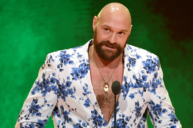LAS VEGAS, NEVADA - OCTOBER 11:  Heavyweight boxer Tyson Fury speaks at a WWE news conference at T-Mobile Arena on October 11, 2019 in Las Vegas, Nevada. Fury will face WWE wrestler Braun Strowman and WWE champion Brock Lesnar will take on former UFC heavyweight champion Cain Velasquez at the WWE's Crown Jewel event at Fahd International Stadium in Riyadh, Saudi Arabia on October 31.  (Photo by Ethan Miller/Getty Images)
