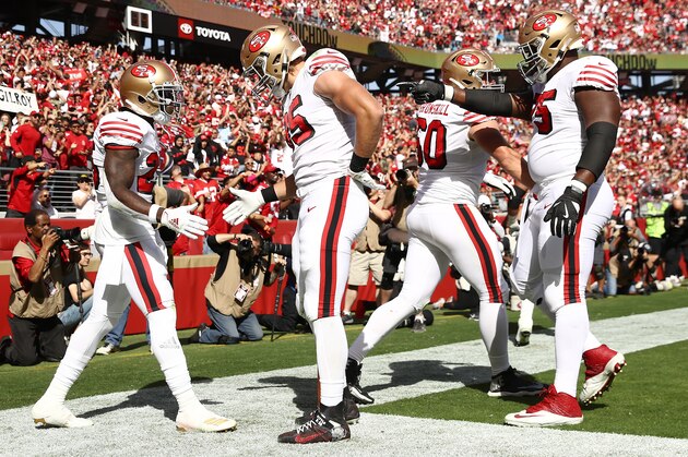 SANTA CLARA, CALIFORNIA - OCTOBER 27: Tevin Coleman #26 of the San Francisco 49ers celebrates with teammates after a 10-yard touchdown reception against the Carolina Panthers during the second quarter at Levi's Stadium on October 27, 2019 in Santa Clara, California. (Photo by Ezra Shaw/Getty Images)