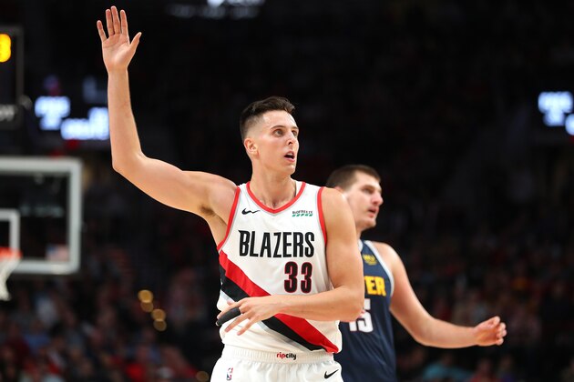 PORTLAND, OREGON - OCTOBER 23: Zach Collins #33 of the Portland Trail Blazers reacts against the Denver Nuggets in the third quarter during their season opener at Moda Center on October 23, 2019 in Portland, Oregon. NOTE TO USER: User expressly acknowledges and agrees that, by downloading and or using this photograph, User is consenting to the terms and conditions of the Getty Images License Agreement (Photo by Abbie Parr/Getty Images)