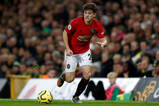 Manchester United's Welsh midfielder Daniel James runs with the ball during the English Premier League football match between Norwich City and Manchester United at Carrow Road in Norwich, eastern England on October 27, 2019. (Photo by Adrian DENNIS / AFP) / RESTRICTED TO EDITORIAL USE. No use with unauthorized audio, video, data, fixture lists, club/league logos or 'live' services. Online in-match use limited to 120 images. An additional 40 images may be used in extra time. No video emulation. Social media in-match use limited to 120 images. An additional 40 images may be used in extra time. No use in betting publications, games or single club/league/player publications. /  (Photo by ADRIAN DENNIS/AFP via Getty Images)