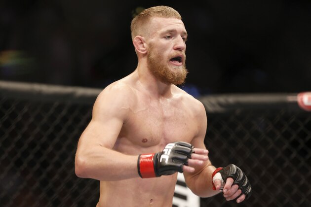Conor McGregor, of Ireland, is seen against Max Holloway in their UFC on Fox Sports 1 mixed martial arts bout in Boston, Saturday, August 17,2013. McGregor won via unanimous decision. (AP Photo/Gregory Payan)