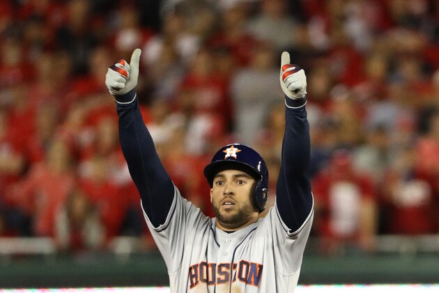 WASHINGTON, DC - OCTOBER 27: George Springer #4 of the Houston Astros celebrates against the Washington Nationals in Game Five of the 2019 World Series at Nationals Park on October 27, 2019 in Washington, DC. (Photo by Patrick Smith/Getty Images)