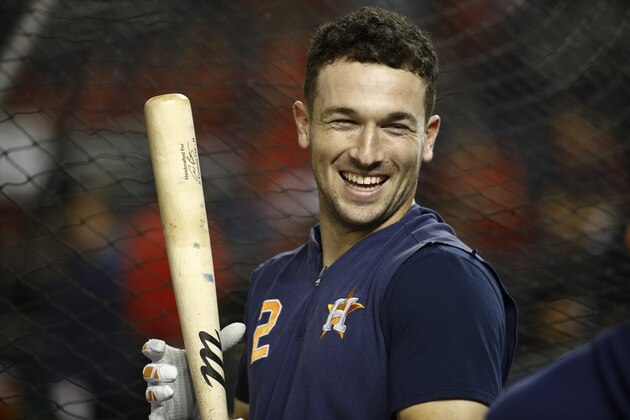 Houston Astros' Alex Bregman smiles during batting practice before Game 5 of the baseball World Series against the Washington Nationals Sunday, Oct. 27, 2019, in Washington. (AP Photo/Patrick Semansky)