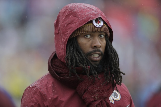 Washington Redskins cornerback Josh Norman looks on from the bench in the first half of an NFL football game against the San Francisco 49ers, Sunday, Oct. 20, 2019, in Landover, Md. (AP Photo/Julio Cortez)