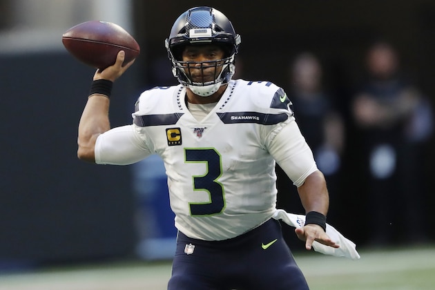 Seattle Seahawks quarterback Russell Wilson (3) works against the Atlanta Falcons during the second half of an NFL football game, Sunday, Oct. 27, 2019, in Atlanta. (AP Photo/John Bazemore)