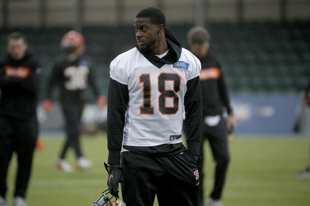 Cincinnati Bengals' wide receiver A. J. Green, 18, who is recovering from an injury, attends an NFL practice session at the Allianz Park stadium in north London, Friday, Oct. 25, 2019. The Cincinnati Bengals are preparing for an NFL regular season game against the Los Angeles Rams in London on Sunday. (AP Photo/Matt Dunham)