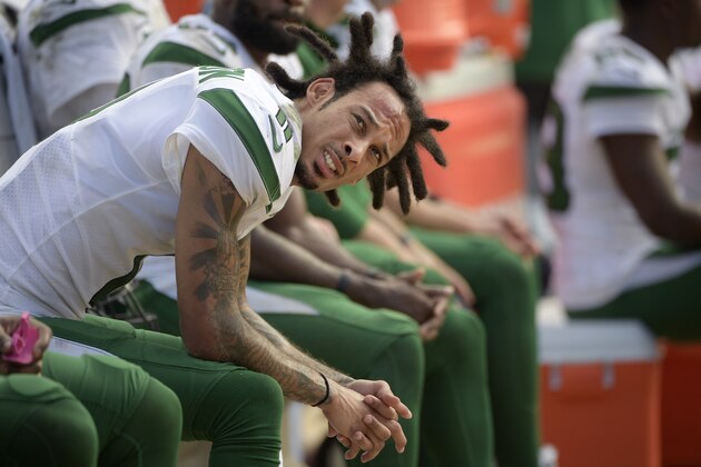 New York Jets wide receiver Robby Anderson (11) reacts to a play from the bench during the second half of an NFL football game against the Jacksonville Jaguars Sunday, Oct. 27, 2019, in Jacksonville, Fla. (AP Photo/Phelan M. Ebenhack)