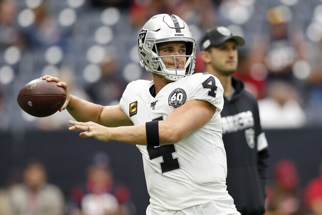 HOUSTON, TX - OCTOBER 27:  Derek Carr #4 of the Oakland Raiders warms up before the game against the Houston Texans at NRG Stadium on October 27, 2019 in Houston, Texas.  (Photo by Tim Warner/Getty Images)