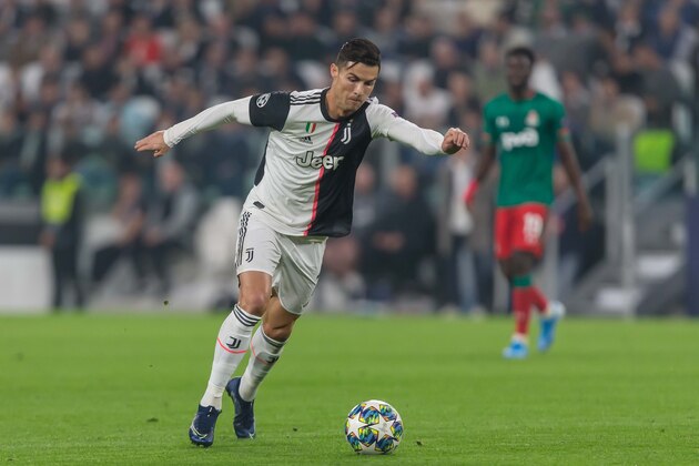 TURIN, ITALY - OCTOBER 22: Christiano Ronaldo of Juventus Turin controls the ball during the UEFA Champions League group D match between Juventus and Lokomotiv Moskva at Juventus Arena on October 22, 2019 in Turin, Italy. (Photo by TF-Images/Getty Images)