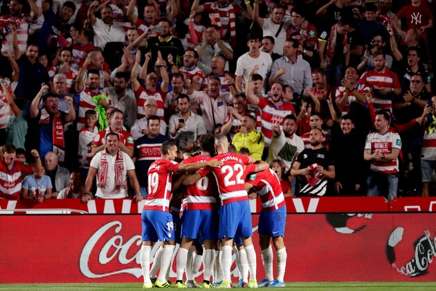GRANADA, SPAIN - SEPTEMBER 21: (L-R) Montoro J.M. of Granada CF, German of Granada CF, Domingos D. of Granada CF celebrate goal during the La Liga Santander  match between Granada v FC Barcelona at the Nuevo Estadio de Los Cármenes on September 21, 2019 in Granada Spain (Photo by Jeroen Meuwsen/Soccrates/Getty Images)