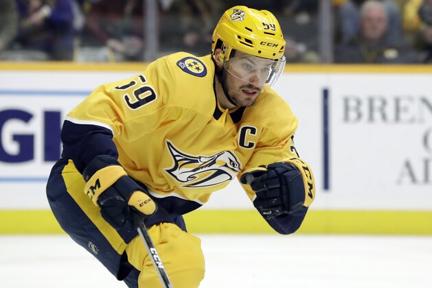 Nashville Predators defenseman Roman Josi, of Switzerland, plays against the Toronto Maple Leafs in the first period of an NHL hockey game Tuesday, March 19, 2019, in Nashville, Tenn. (AP Photo/Mark Humphrey)
