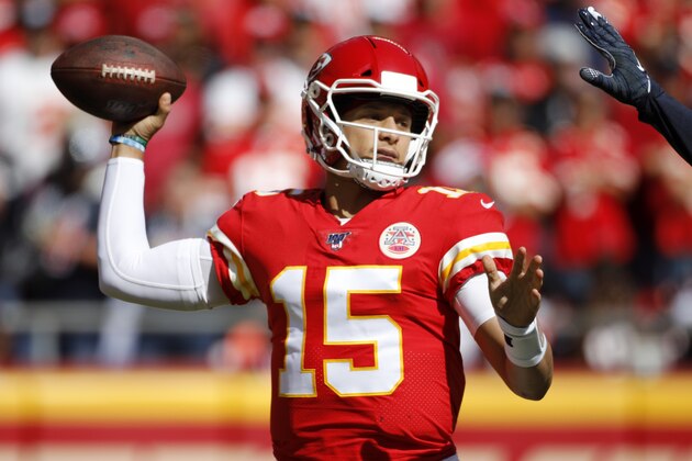 Kansas City Chiefs quarterback Patrick Mahomes (15) throws a pass during the first half of an NFL football game against the Houston Texans in Kansas City, Mo., Sunday, Oct. 13, 2019. (AP Photo/Colin E. Braley)