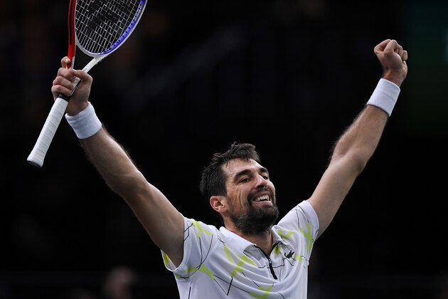 France's Jeremy Chardy celebrates after winning against Russia's Daniil Medvedev during their men's singles tennis match on day two of the ATP World Tour Masters 1000 - Rolex Paris Masters - indoor tennis tournament at The AccorHotels Arena in Paris on October 29, 2019. (Photo by Christophe ARCHAMBAULT / AFP) (Photo by CHRISTOPHE ARCHAMBAULT/AFP via Getty Images)