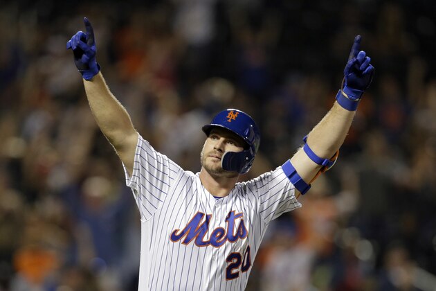 New York Mets Pete Alonso reacts after hitting hitting a home run during the third inning of a baseball game against the Atlanta Braves on Saturday, Sept. 28, 2019, in New York. Alonso hit his 53rd home run of the season, breaking the rookie record Yankees star Aaron Judge set in 2017. (AP Photo/Adam Hunger)