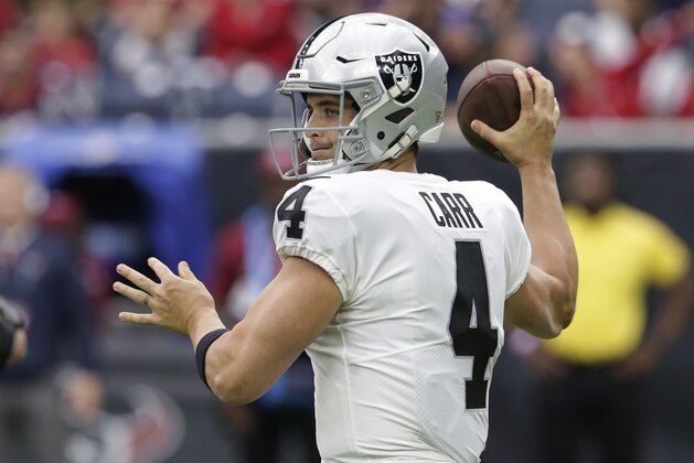 Oakland Raiders quarterback Derek Carr (4) throws against the Houston Texans during the first half of an NFL football game Sunday, Oct. 27, 2019, in Houston. (AP Photo/Michael Wyke)
