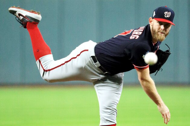 HOUSTON, TEXAS - OCTOBER 29:  Stephen Strasburg #37 of the Washington Nationals delivers the pitch against the Houston Astros during the first inning in Game Six of the 2019 World Series at Minute Maid Park on October 29, 2019 in Houston, Texas. (Photo by Mike Ehrmann/Getty Images)